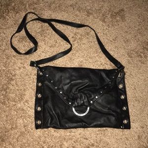 Vans over the should purse